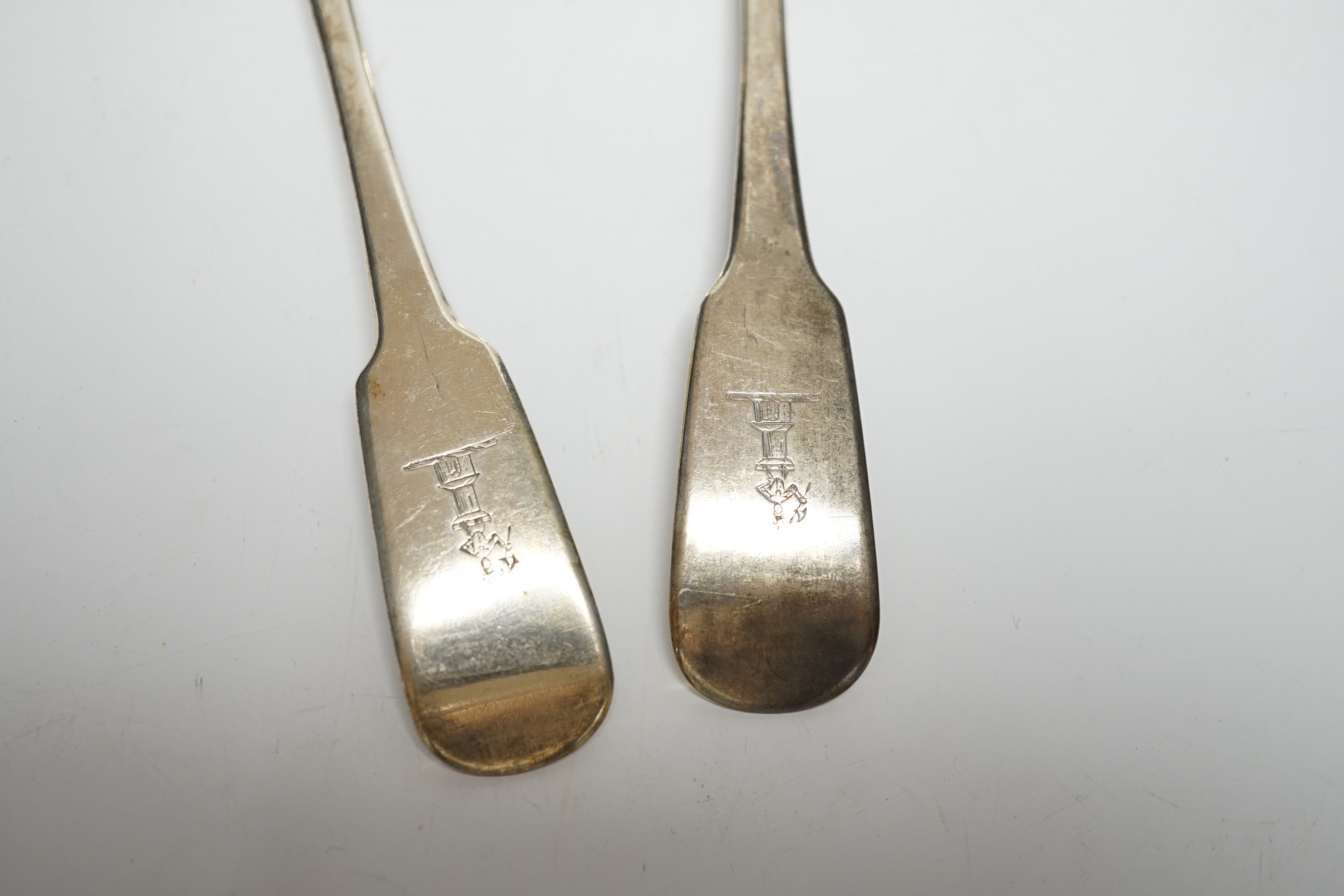 A pair of George IV Irish silver fiddle pattern sauce ladles, Lawrence Nowlan, Dublin, 1825, 15.8cm.